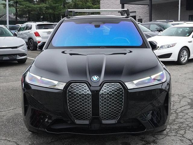 used 2024 BMW iX car, priced at $61,995
