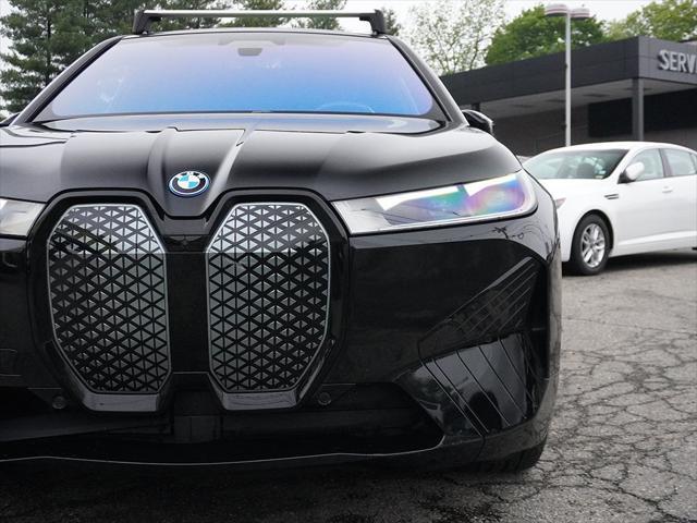 used 2024 BMW iX car, priced at $61,995
