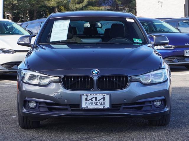 used 2018 BMW 330 car, priced at $13,490