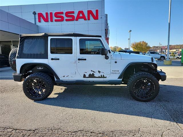 used 2016 Jeep Wrangler Unlimited car, priced at $17,988