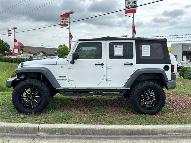 used 2013 Jeep Wrangler Unlimited car, priced at $12,989