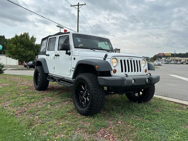 used 2013 Jeep Wrangler Unlimited car, priced at $12,989