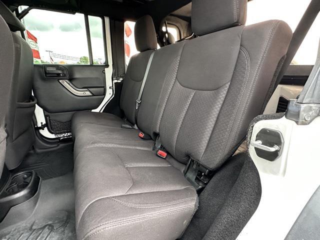 used 2013 Jeep Wrangler Unlimited car, priced at $12,989