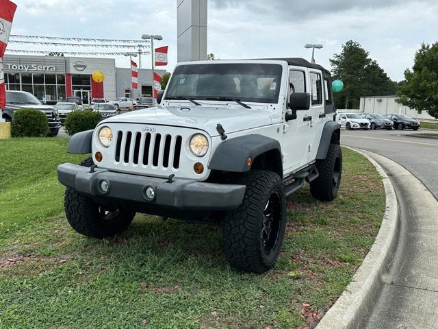 used 2013 Jeep Wrangler Unlimited car, priced at $12,989