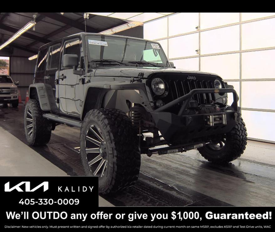 used 2018 Jeep Wrangler JK Unlimited car, priced at $21,750