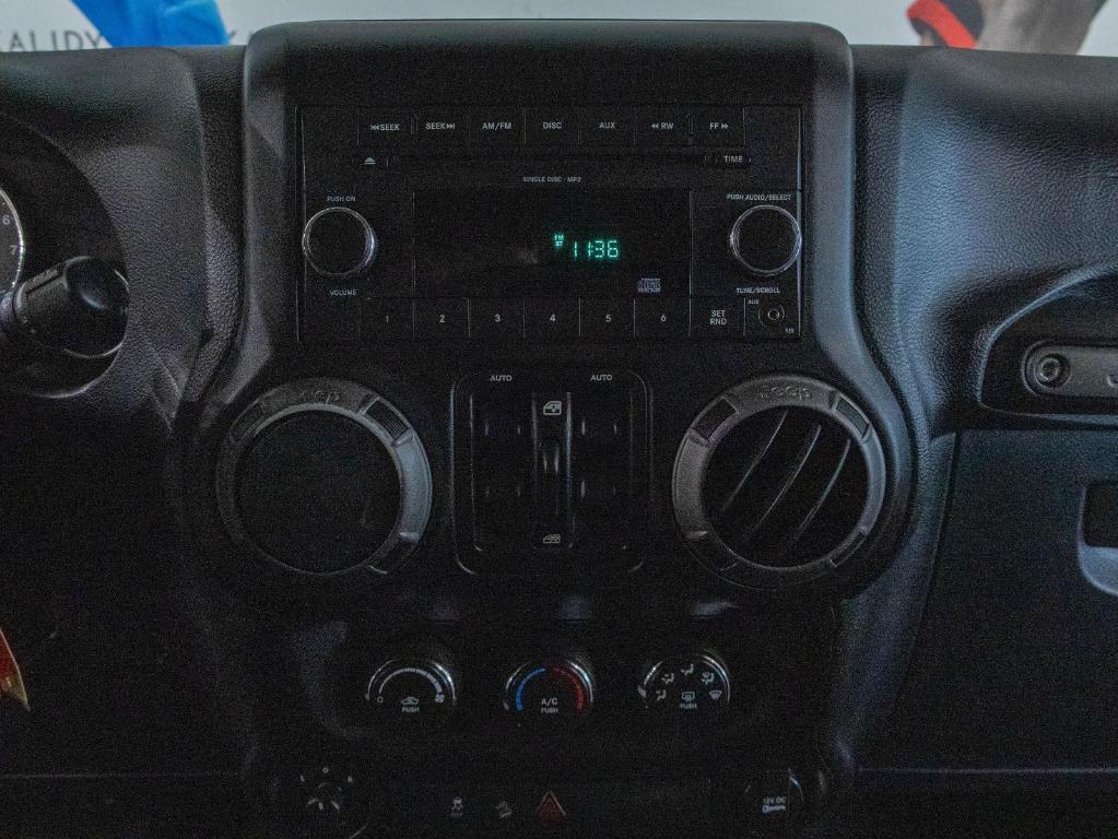 used 2011 Jeep Wrangler Unlimited car, priced at $14,500