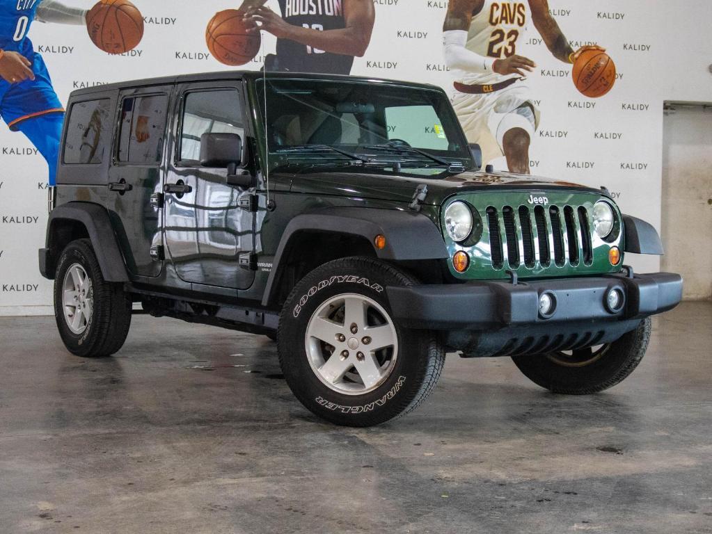 used 2011 Jeep Wrangler Unlimited car, priced at $14,500