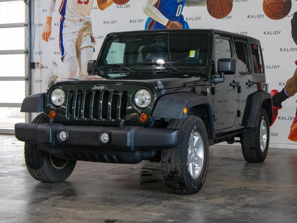 used 2011 Jeep Wrangler Unlimited car, priced at $14,500