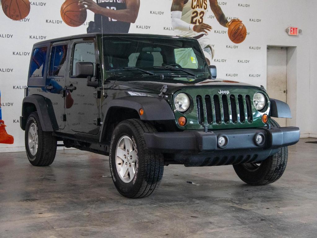 used 2011 Jeep Wrangler Unlimited car, priced at $14,500