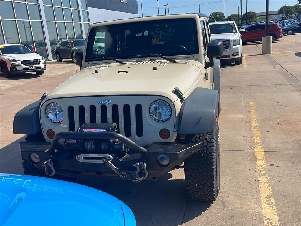 used 2011 Jeep Wrangler Unlimited car, priced at $15,000
