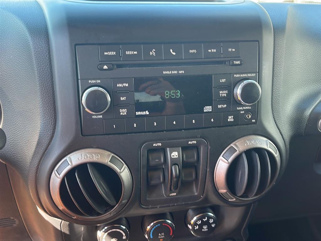 used 2011 Jeep Wrangler Unlimited car, priced at $15,000