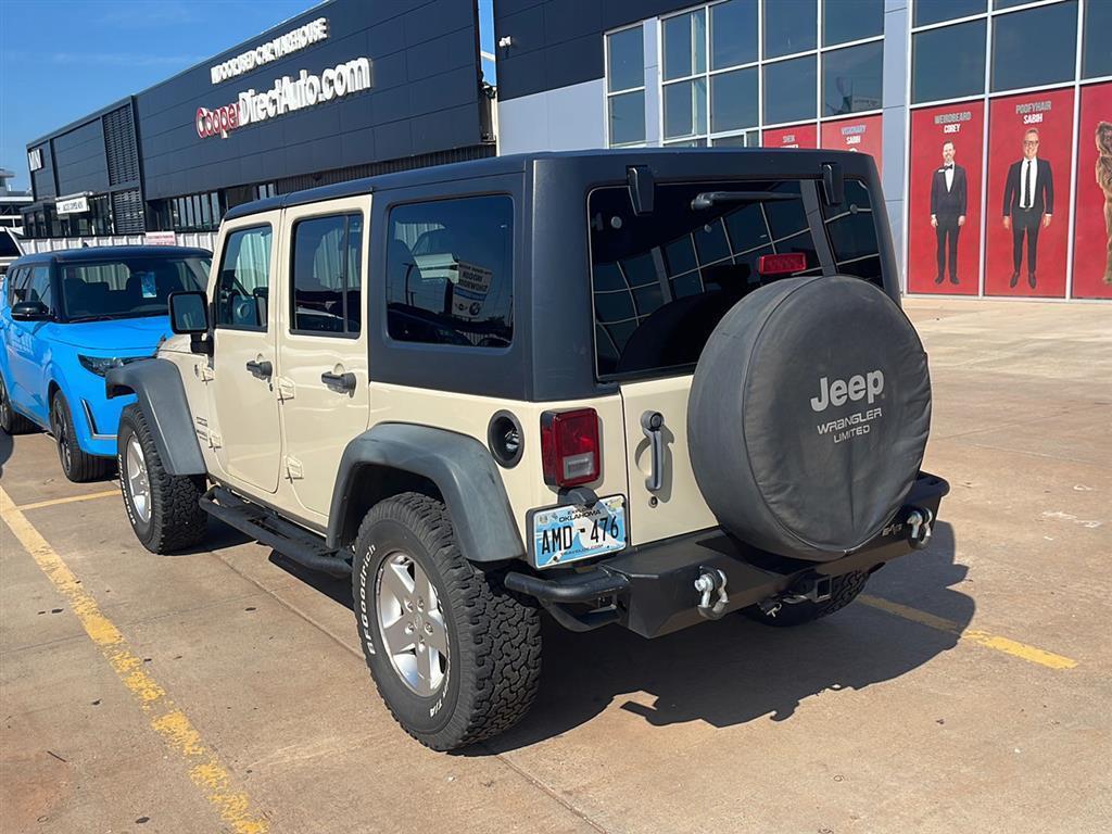 used 2011 Jeep Wrangler Unlimited car, priced at $15,000
