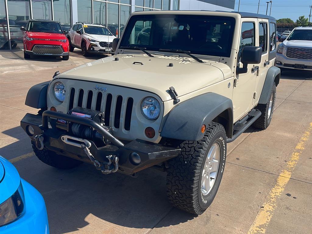 used 2011 Jeep Wrangler Unlimited car, priced at $15,000