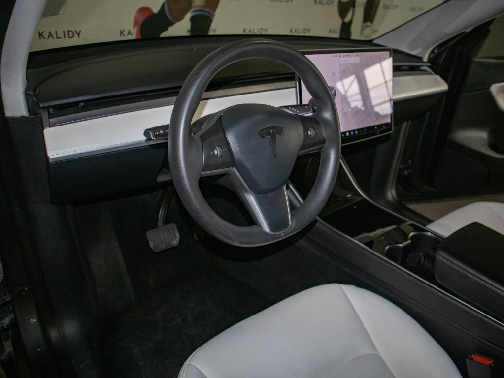 used 2021 Tesla Model Y car, priced at $28,750