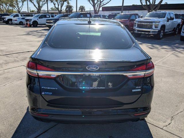 used 2018 Ford Fusion car, priced at $12,690