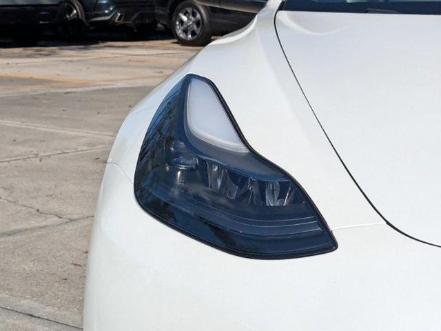 used 2023 Tesla Model 3 car, priced at $30,599