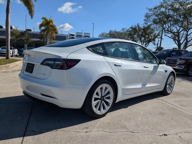 used 2023 Tesla Model 3 car, priced at $30,599