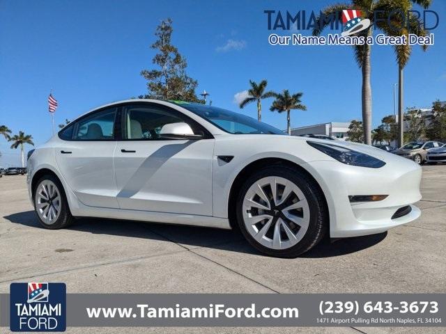 used 2023 Tesla Model 3 car, priced at $30,599