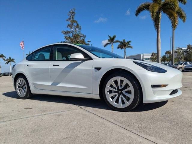 used 2023 Tesla Model 3 car, priced at $30,599