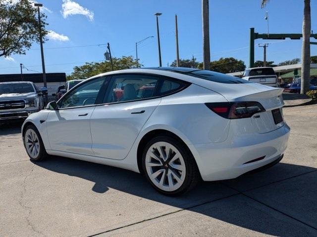 used 2023 Tesla Model 3 car, priced at $30,599