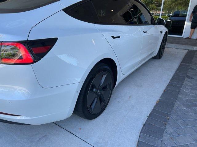used 2021 Tesla Model 3 car, priced at $15,000
