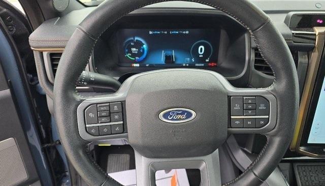 used 2023 Ford F-150 Lightning car, priced at $54,099