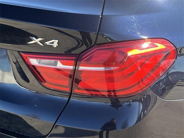 used 2018 BMW X4 car, priced at $19,999