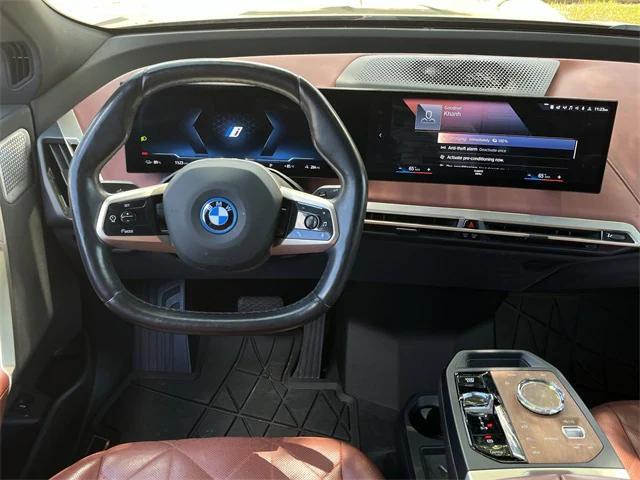 used 2023 BMW iX car, priced at $54,986
