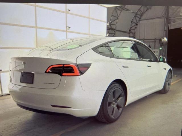 used 2022 Tesla Model 3 car, priced at $27,684