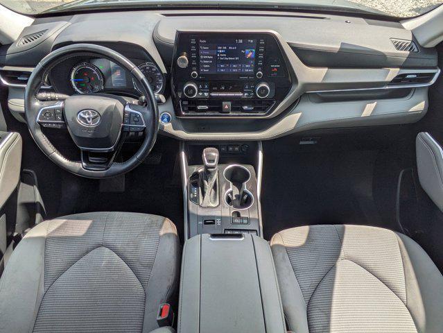 used 2021 Toyota Highlander Hybrid car, priced at $34,140