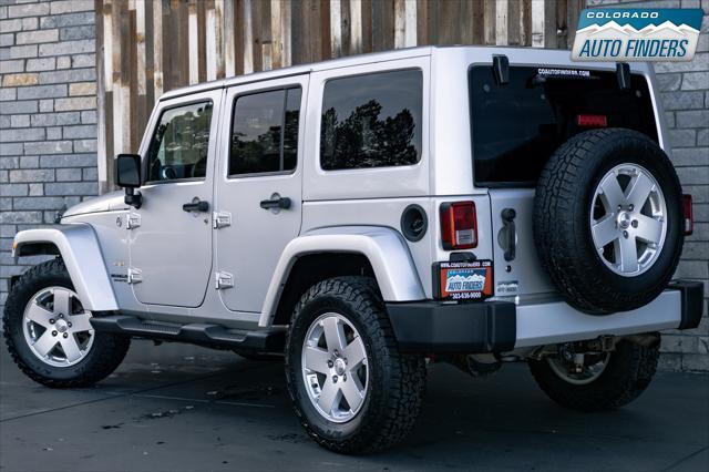 used 2012 Jeep Wrangler Unlimited car, priced at $16,498