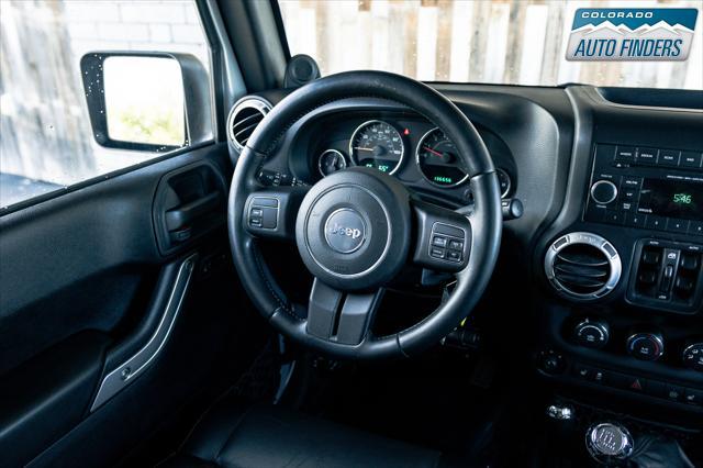 used 2012 Jeep Wrangler Unlimited car, priced at $16,498