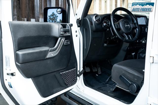 used 2015 Jeep Wrangler Unlimited car, priced at $16,990