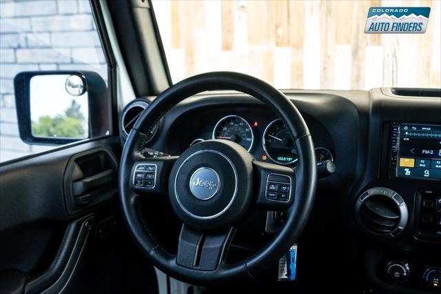 used 2015 Jeep Wrangler Unlimited car, priced at $16,990