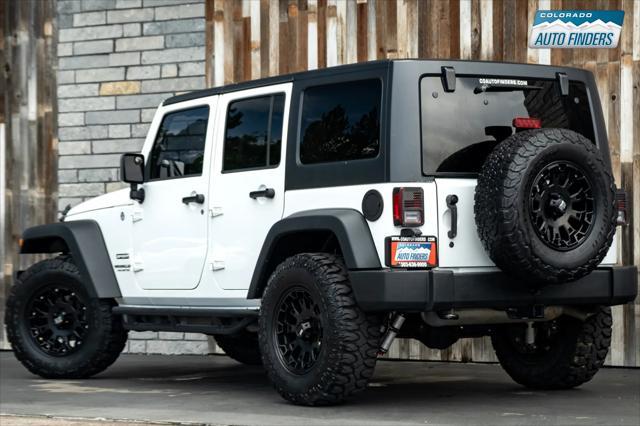 used 2015 Jeep Wrangler Unlimited car, priced at $16,990