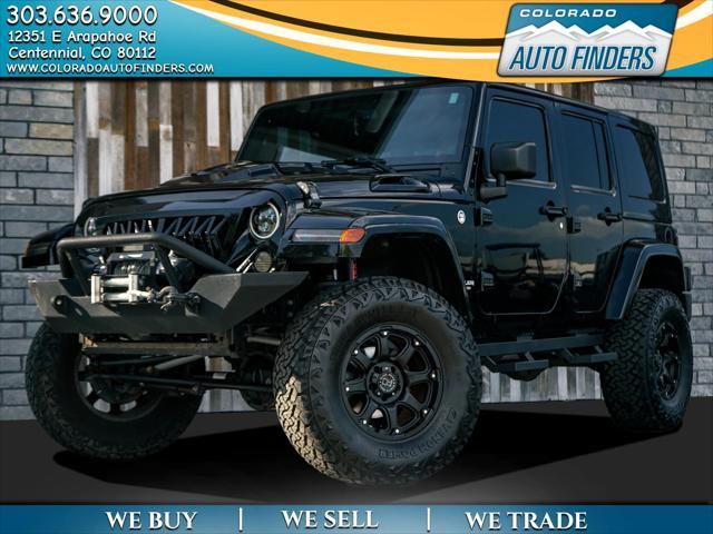 used 2014 Jeep Wrangler Unlimited car, priced at $29,698