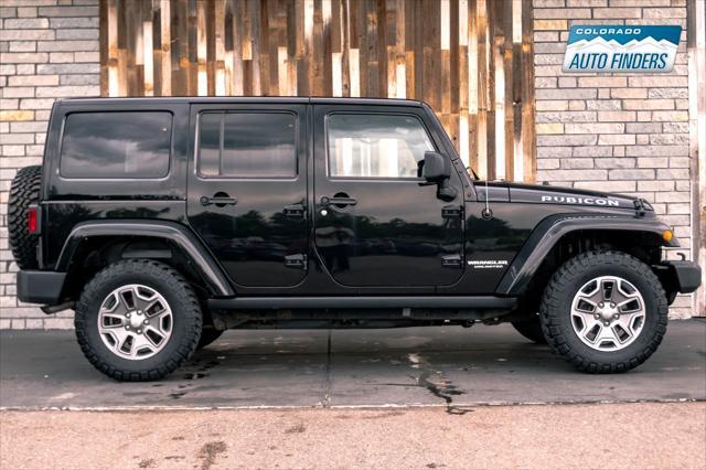 used 2014 Jeep Wrangler Unlimited car, priced at $21,488