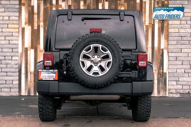 used 2014 Jeep Wrangler Unlimited car, priced at $21,488