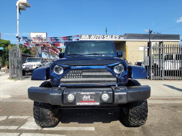 used 2013 Jeep Wrangler Unlimited car, priced at $14,995