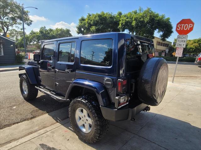 used 2013 Jeep Wrangler Unlimited car, priced at $14,995