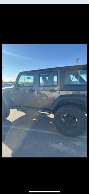 used 2014 Jeep Wrangler Unlimited car, priced at $22,582