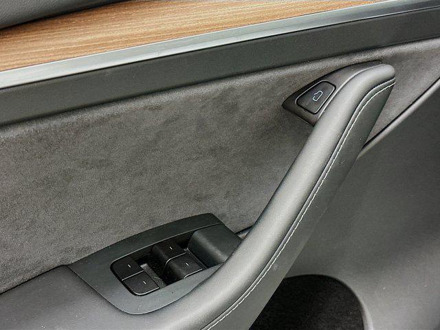 used 2025 Tesla Model Y car, priced at $39,997