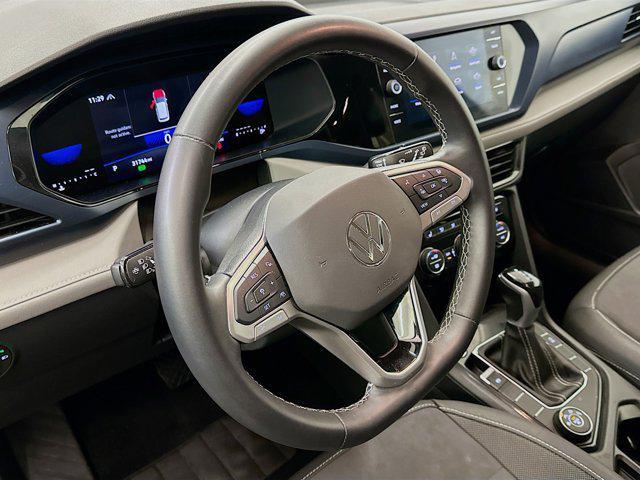 used 2024 Volkswagen Taos car, priced at $20,997