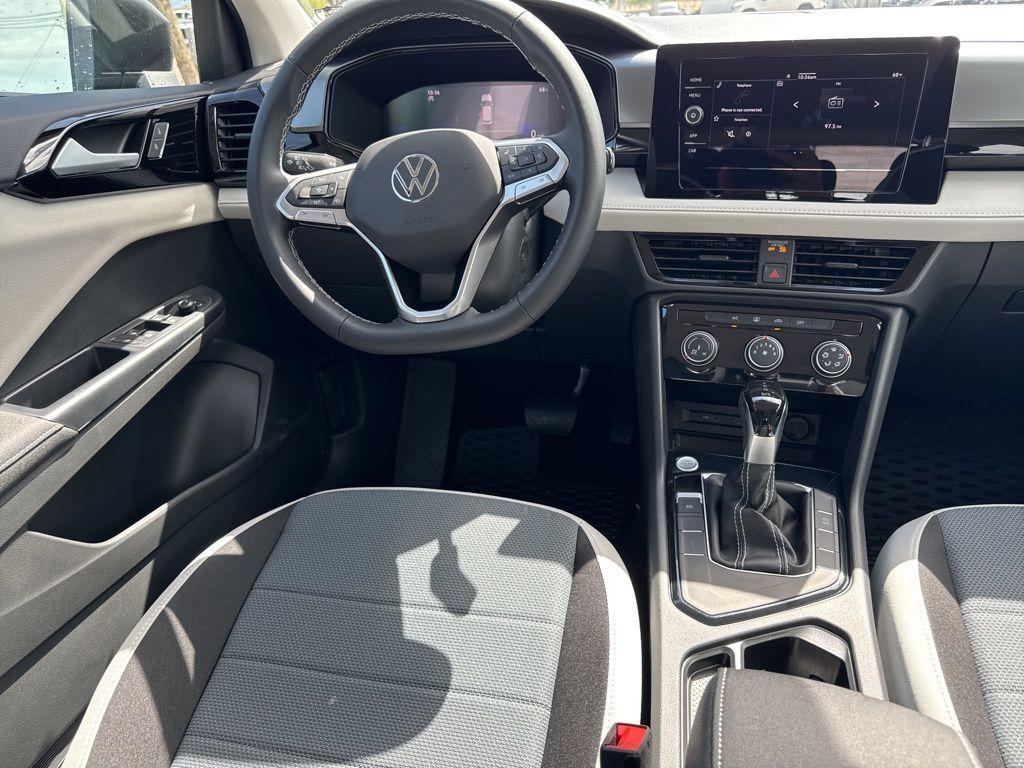 new 2025 Volkswagen Taos car, priced at $27,011