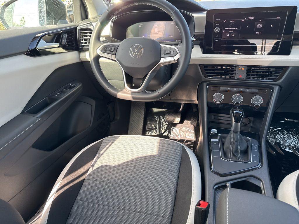 new 2025 Volkswagen Taos car, priced at $27,011