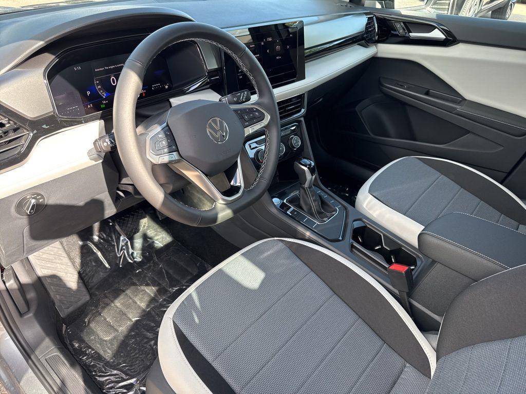new 2025 Volkswagen Taos car, priced at $27,011