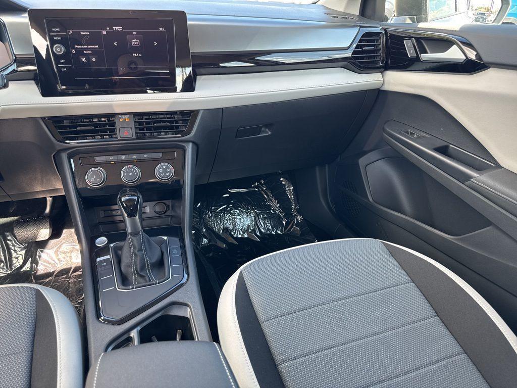 new 2025 Volkswagen Taos car, priced at $27,011
