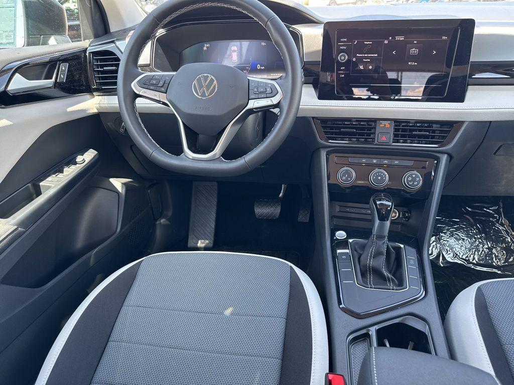 new 2025 Volkswagen Taos car, priced at $27,011