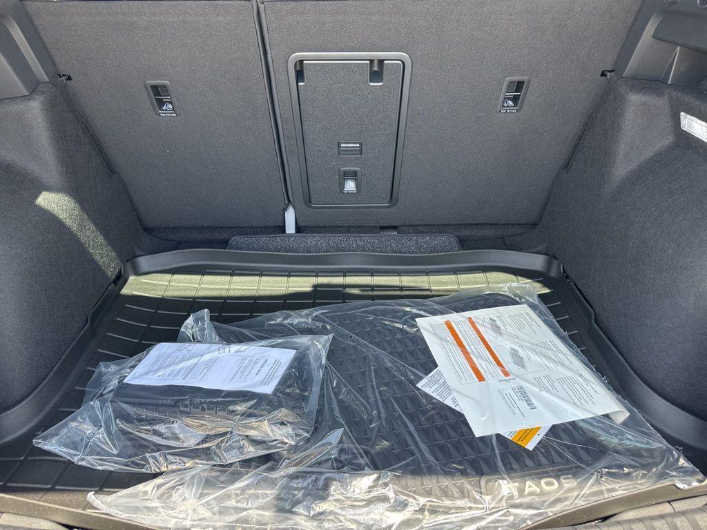 new 2025 Volkswagen Taos car, priced at $27,011
