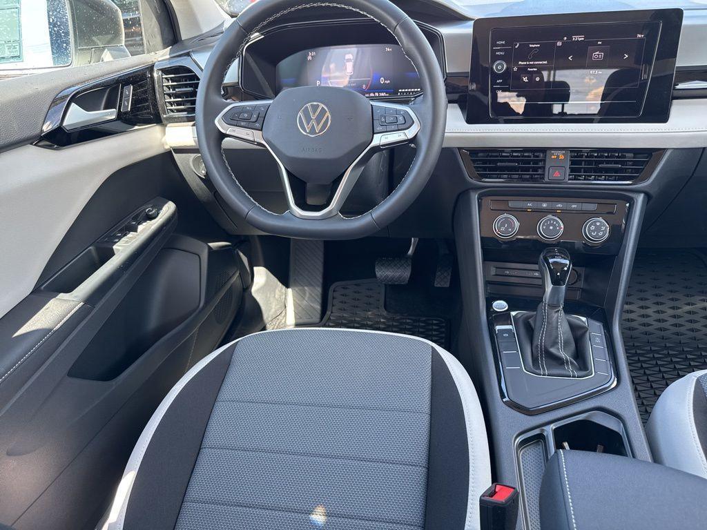 new 2025 Volkswagen Taos car, priced at $27,011